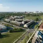 Aerial drone view of the Presto Towns Scarborough development site, showcasing the master-planned townhome community integrated into a lush, green residential neighborhood near local shopping and parks.