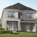 Modern two-story detached house with a double car garage in the Springwater community by Mattamy Homes, showcasing a contemporary grey stone and brick exterior under a dark roof.