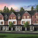 Architectural rendering of Whitehorn Woods townhouses showcasing a mix of red brick, white stone masonry, and dark gabled roofs surrounded by lush green landscaping.
