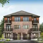 Front elevation of the Empire Canals Village Townhomes, a three-story multi-family building with brick and wood-style siding, integrated garages, and private balconies.