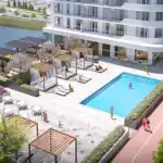 High-angle rendering of the Thompson Towers outdoor amenity terrace featuring a large blue swimming pool, luxury cabanas with white curtains, a splash pad, and landscaped lounge areas next to the residential building.