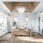 Luxury modern kitchen at Eversley Estates featuring white shaker cabinets, a wood-paneled tray ceiling, marble countertops, and a large center island with gold accents.