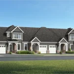 Architectural rendering of a modern Lakehaven townhouse row featuring dark grey vertical siding, white trim, and stone accents under a clear blue sky.