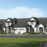 Modern farmhouse style townhouse block in Lakehaven showcasing white board and batten siding, dark shingle roofs, and neatly landscaped front yards.