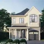A two-story detached single-family home in Milton Village showcasing a contemporary white and grey stone exterior with a covered front porch and integrated garage.