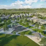 Aerial view of the Avon Park community showing a green park, playground, walking paths, and surrounding homes.