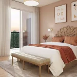 Modern bedroom interior at Alister at Solterra showcasing a unique fan-shaped wicker headboard, warm earthy tones, a plush area rug, and bright natural light from a balcony door.