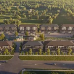 Aerial 3D architectural rendering of The Block on Clair townhome community, showing multi-story modern residential buildings surrounded by green spaces, parking areas, and trees under a bright sky.