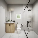 Contemporary bathroom design at Townhomes of Little Rouge including a glass-enclosed walk-in shower with black hardware, a light wood vanity, and white marble floor tiles.