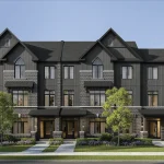 Modern freehold townhomes at SouthCal in Caledon by Deco Homes featuring dark contemporary siding, steep gables, and large windows for natural light.