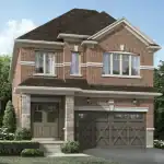 Exterior rendering of a classic red brick two-story detached home at Woodstone Trails in Dundalk, featuring a double garage with decorative cross-bracing and stone-pillared porch.
