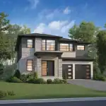 Modern 45-foot detached home at Summersides Village showcasing a contemporary design with light grey stone masonry, dark grey horizontal siding, and a flat-style roofline. The home includes a double-car garage with vertical window panels and large, sleek black-framed windows.