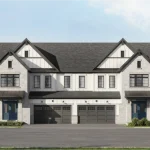 Exterior front elevation rendering of modern townhouses at St Davids Collection showing grey stone and board-and-batten siding, dark roof gables, private double garages, and blue front entry doors.