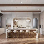 A luxury modern kitchen in The Legacy community featuring a large marble waterfall island with five gold-legged barstools, wood-beamed ceilings, and an arched alcove with a marble backsplash and gold fixtures.