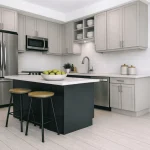 Modern open-concept kitchen in West Community with light grey shaker cabinets, a dark navy center island with seating, stainless steel appliances, and white subway tile backsplash.