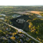 Aerial view of the surrounding green landscape and land parcel for Gates of St. Anne’s community development at Shining Hill