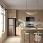 Contemporary kitchen interior at South Banks with light wood cabinetry, stainless steel appliances, kitchen island with seating, and a branded tote bag.