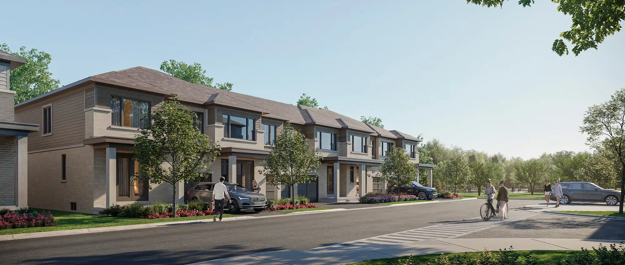 Streetscape rendering of modern two-story townhomes at The Enclave by Cachet, featuring neutral brick facades, manicured front gardens, and people walking and cycling on a sunny day.