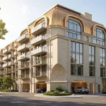 Architectural exterior of The Bridle Prestige luxury condominium building showcasing stone cladding, arched golden roof detailing, glass balconies, and an arched ground-floor drive-through entryway with cars.
