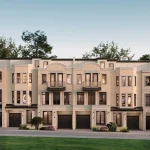 Exterior rendering of a modern 3-story luxury townhome block with stone facades, ground-floor garages, and private balconies at Shining Hill by Townwood Homes.
