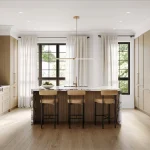 Modern luxury kitchen interior at Abacot Hill featuring light oak cabinetry, marble waterfall island with seating, brass fixtures, and a glass-enclosed wine display.
