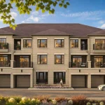 Exterior architecture of back-to-back townhomes in The Mill Pond Collection at Bond Townhomes with stone cladding, multi-level balconies, and modern garages