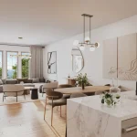 Modern open-concept living and dining room interior at The Breakers featuring light wood floors, a marble waterfall kitchen island, and large windows with coastal tree views.