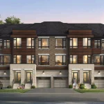Architectural rendering of contemporary townhouses at Valley Brooke featuring dark brick masonry, wood panelling, built-in garages, and front entryway steps.